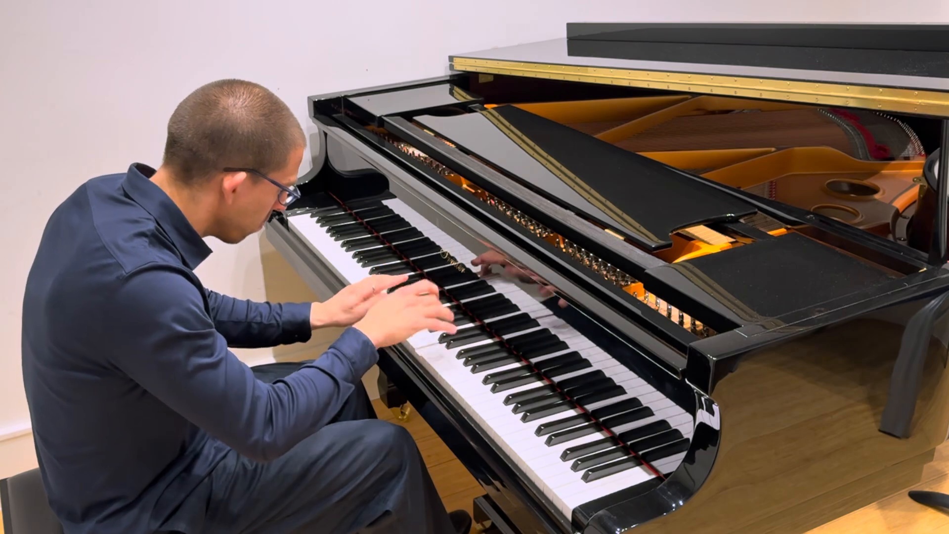 Matias performing Bach at the piano